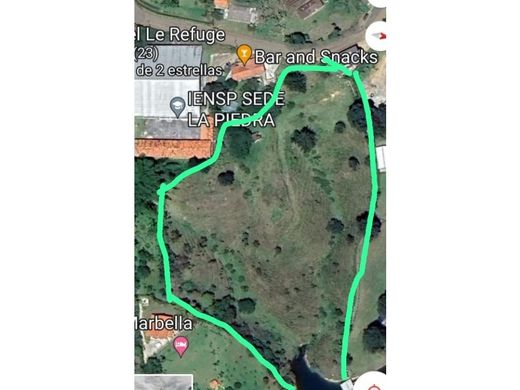 Grond in El Peñol, Yarumal